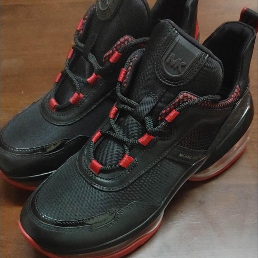 Michael Kors Size 11 Rare Black/Red Edition paid $245 asking $180. For college